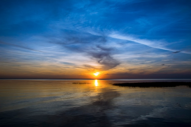 Beautiful colorful sunset under sea. evening sunset.