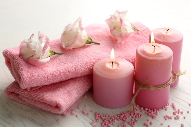 Beautiful composition of spa treatment on a white wooden table