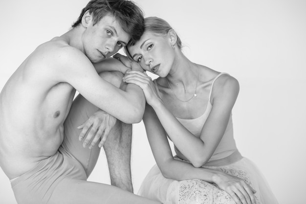 Beautiful couple of ballet dancers lifestyle portrait