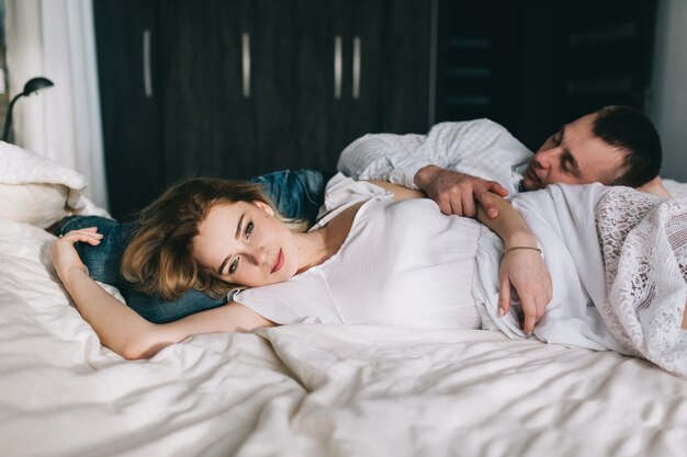 Beautiful couple on bed