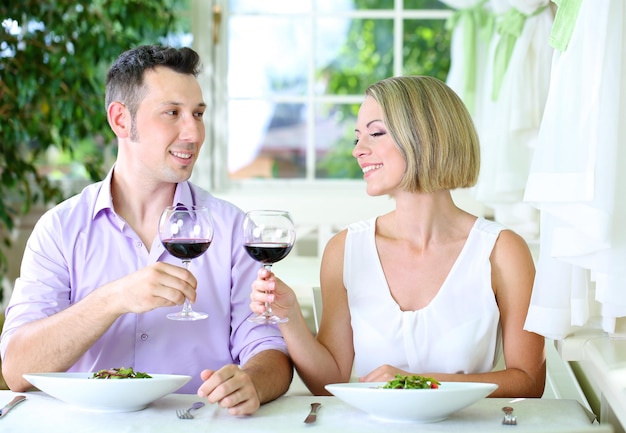 Beautiful couple having  romantic dinner at restaurant