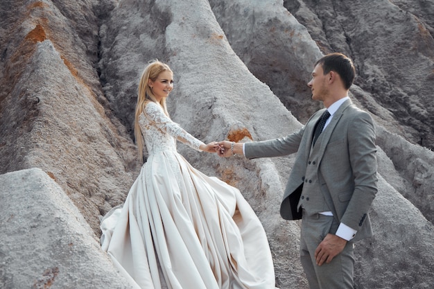 Beautiful couple in love on a fabulous landscape