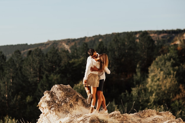 Beautiful couple on a wonderful mountains with amazing view