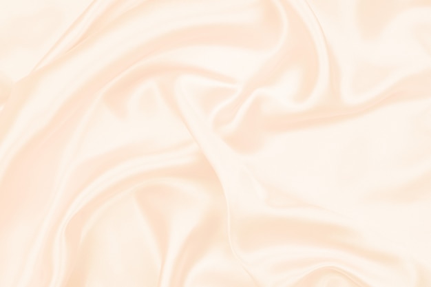 Beautiful cream silk texture luxurious satin  abstract background. fabric