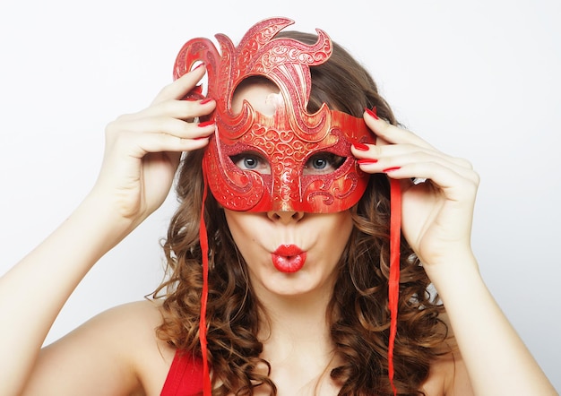 Beautiful curly woman with mask