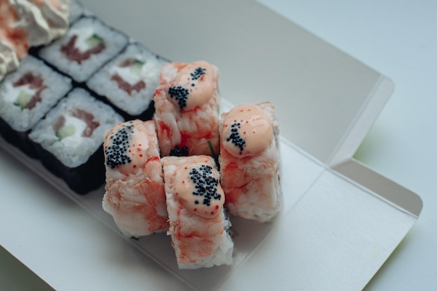 Beautiful delicious sushi Sushi delivery Advertising sushi rolls made of fish and cheese