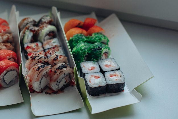 Beautiful delicious sushi Sushi delivery Advertising sushi rolls made of fish and cheese