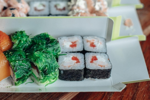 Beautiful delicious sushi Sushi delivery Advertising sushi rolls made of fish and cheese