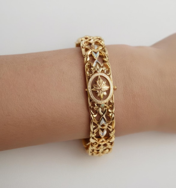 Beautiful designed gold bracelet on white background