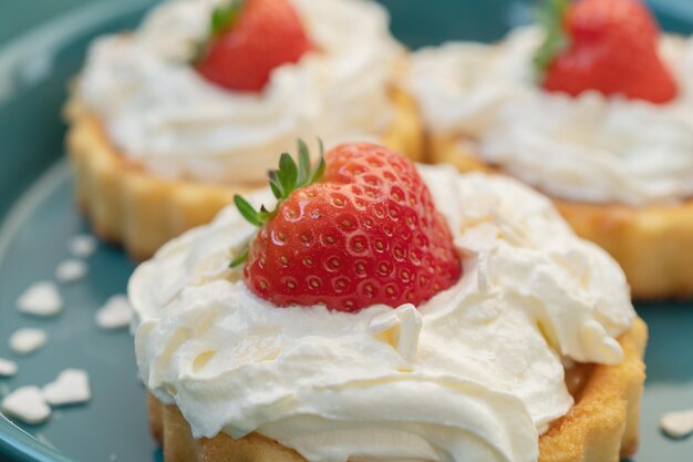 A beautiful dessert of sponge cake and cream with strawberries