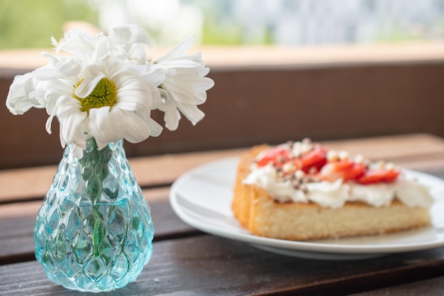 A beautiful dessert of sponge cake and cream with strawberries