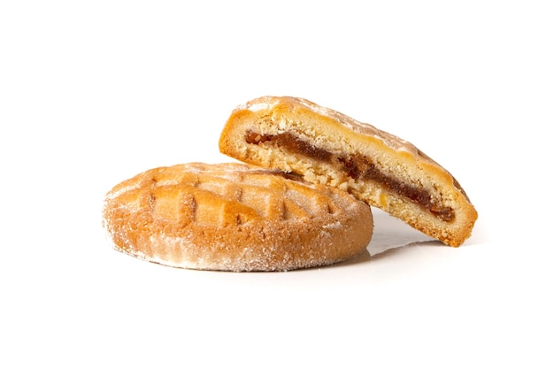 Beautiful dessert strudel cookies with apple jam and cinnamon on a white background