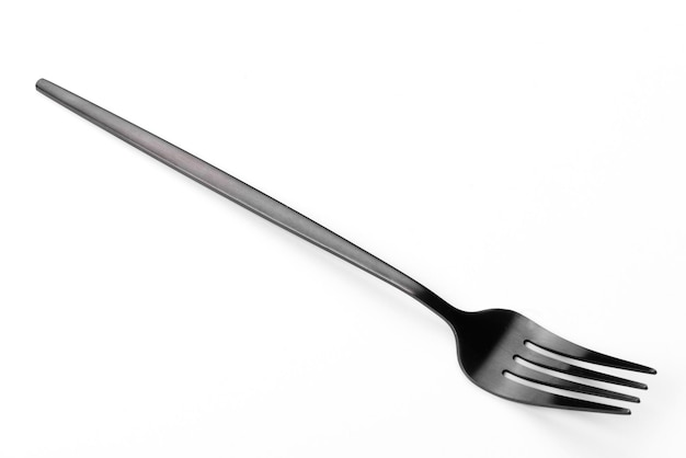 Beautiful dining fork isolated on a white background. Cutlery on a white background