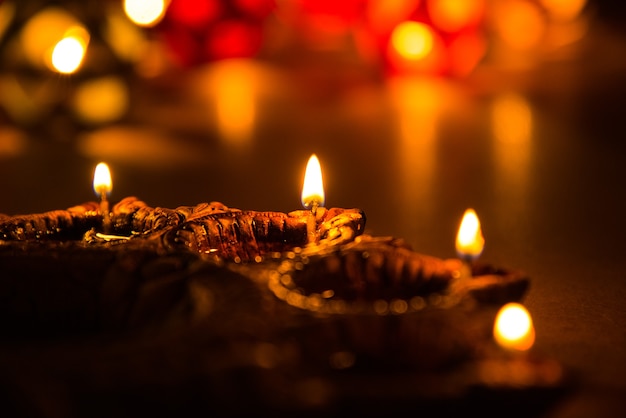 Beautiful diwali lighting or diya or clay oil lamp, selective focus