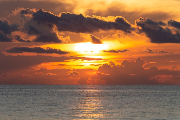 Beautiful dramatic cloudscape landscape sunset from the beach