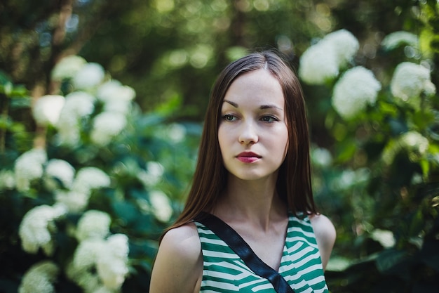 Beautiful dreamy girl Romantic portrait of a beautiful young girl in the park