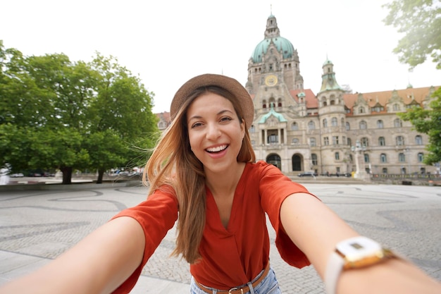 Beautiful excited school exchange girl takes self portrait in Hanover Germany