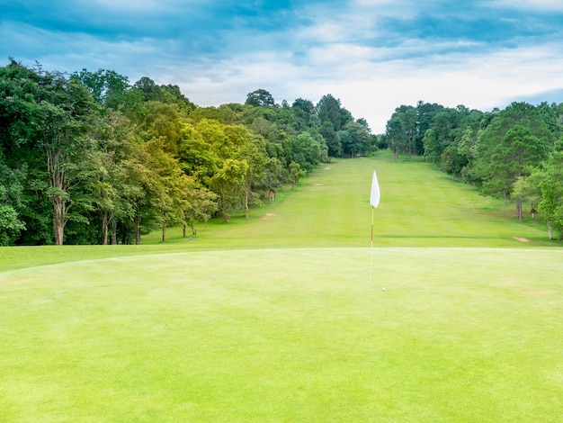 Beautiful fairway in golf course on blue sky 