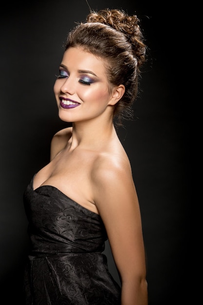 Beautiful fashion woman with proffessional bright makeup  studio shot