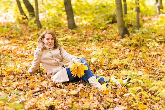 Beautiful female in the autumn park