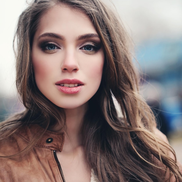 Beautiful female face outdoors portrait