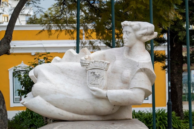 Beautiful female statue on garden