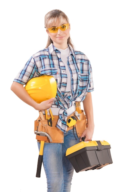 Beautiful female wearing working clothes with tools isolated on white background