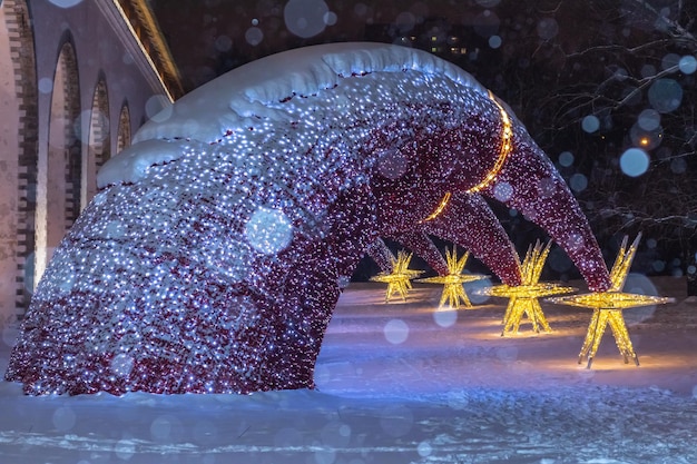 Beautiful festive illuminations on the snow background close up Rostokino district MoscowRussia