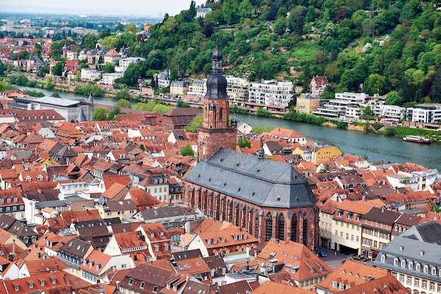 Beautiful Germany Aerial view over Heidelberg town in Spring City center including main cathedral river Neckar and hills with forest