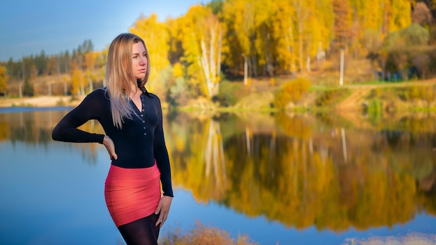 Beautiful girl in the autumn park