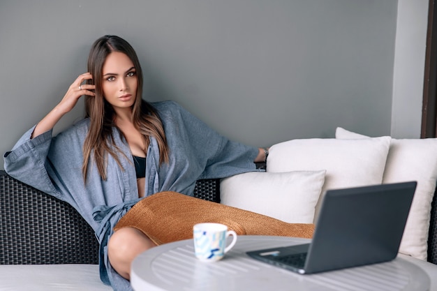 Beautiful girl drinking coffee in the morning