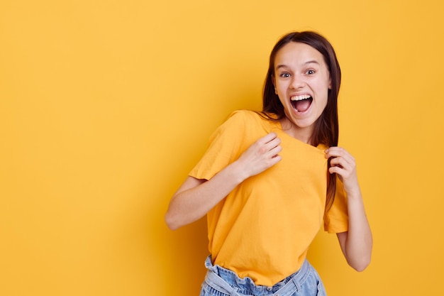 Beautiful girl fashion in yellow tshirt denim shorts Lifestyle unaltered