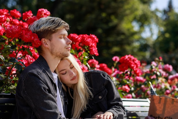 A beautiful girl leaning on her boyfriend