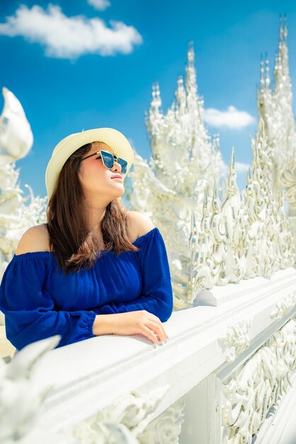 Beautiful girl visits the White Temple Chiang Rai