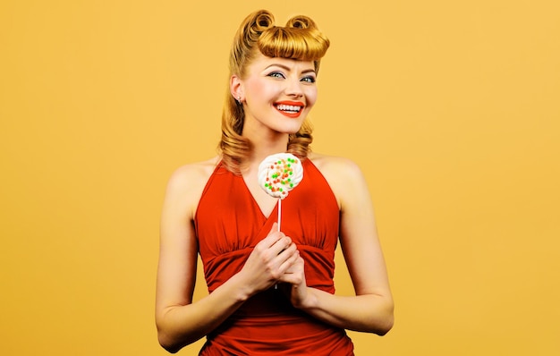 Beautiful girl with fashion hairstyle with lollipop sexy woman with candy sucker sweet life