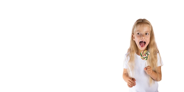 Beautiful girl with a lollipop on a white background Banner horizontal orientation copy space