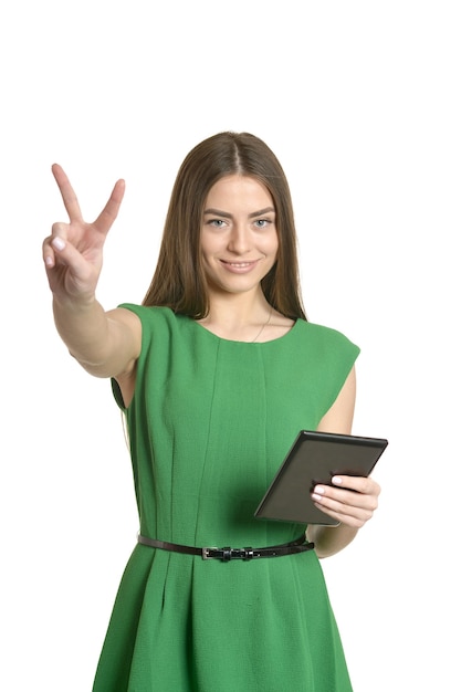 Beautiful girl with tablet pc on a white background