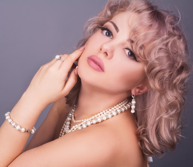 Beautiful girl with white jewellery