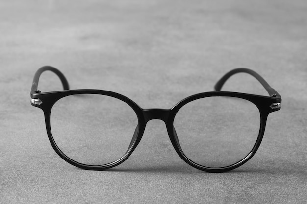 Beautiful glasses on grey background