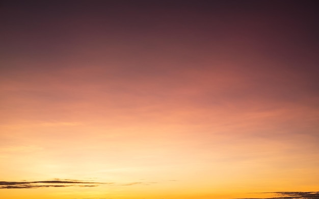 Beautiful gradient orange clouds and sunlight on the blue sky perfect for the background take in everningTwilight