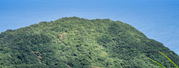 Beautiful grassland, prairie in Taoyuan Valley, Caoling Mountain Trail passes over the peak of Mt. Wankengtou in Taiwan.