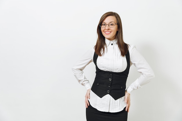 Beautiful happy caucasian young smiling brown-hair business woman in black suit, white shirt and glasses looking camera isolated on white background. Manager or worker. Copy space for advertisement.