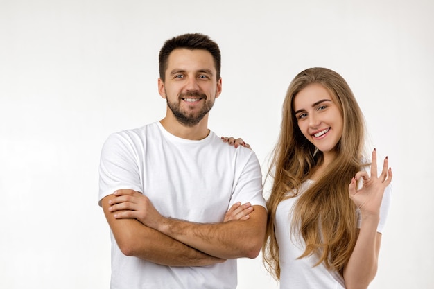 Beautiful happy couple looking at camera