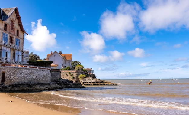 Beautiful house on sea coast with scenic view on ocean and sky beach vacation building on seashore