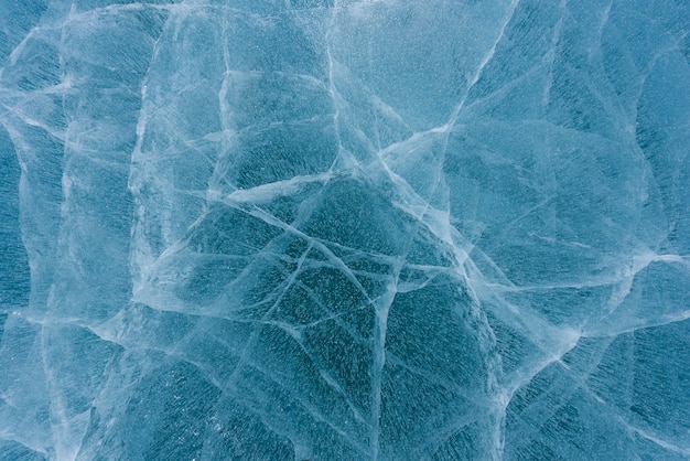 Beautiful ice of Lake Baikal with abstract cracks