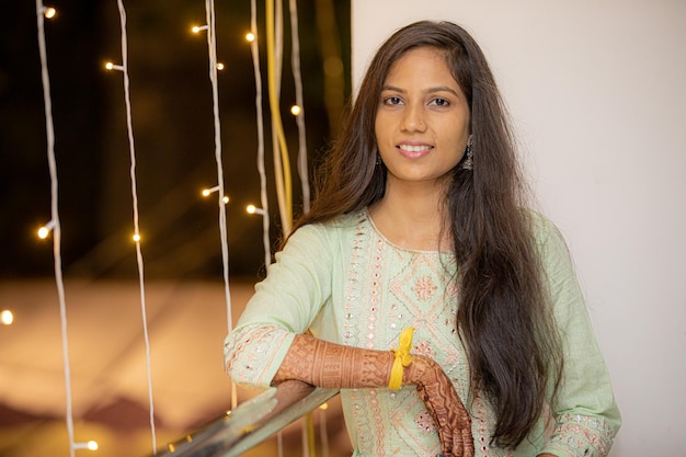 beautiful indian girl in ethnic clothes at wedding