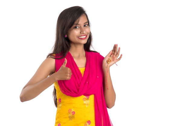 Beautiful Indian girl showing Rakhis on occasion of Raksha bandhan 