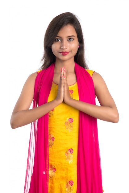 Beautiful Indian girl with welcome expression or greeting Namaste