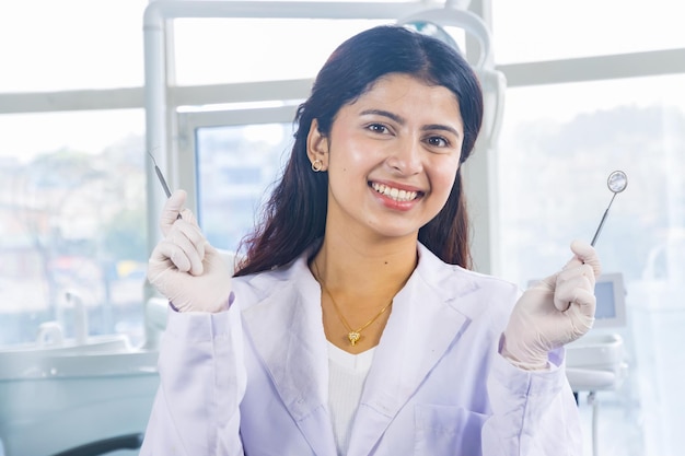 Beautiful Indian Looking Nepali Dentist Doctor Girl Smiling and Giving gestures