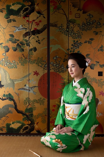 Beautiful japanese woman in a green kimono